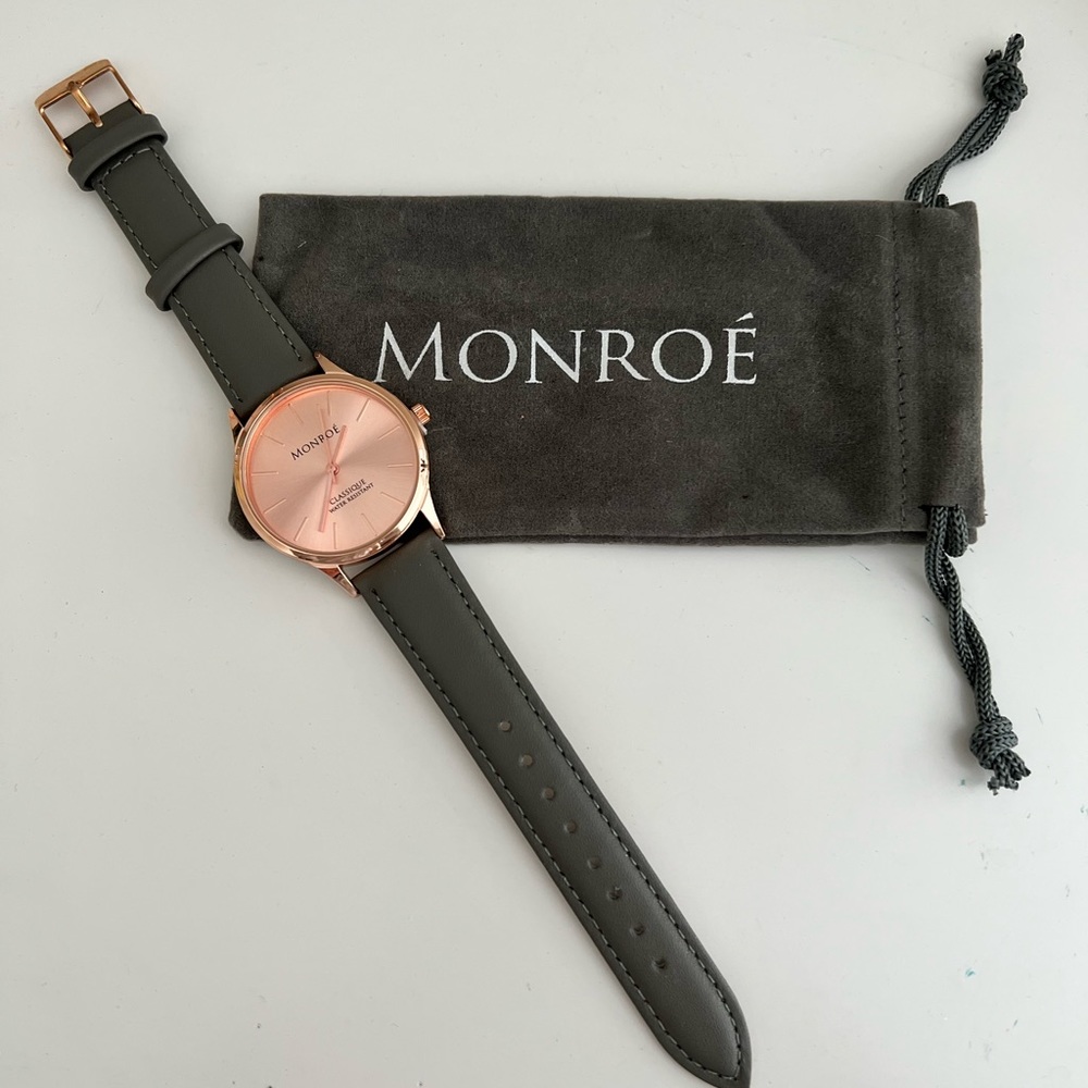 Monroe by Maestro rose gold watch with storage pouch.